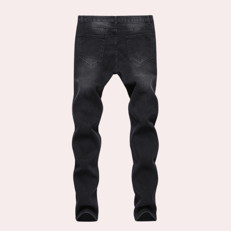 Kreative herrejeans med malingsdesign